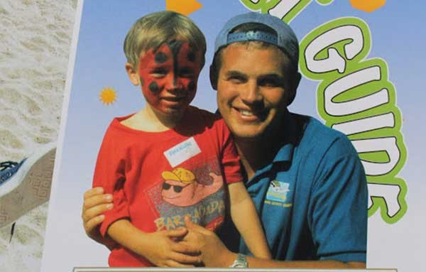 Happy staff and children on the Barracudas Activity Camp brochure