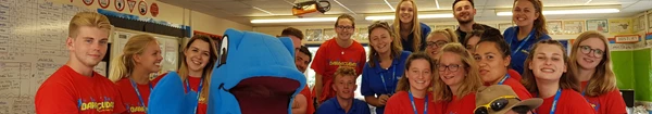 Group staff picture with our mascot billy