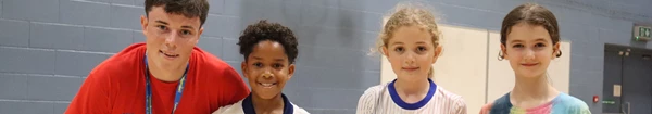 Staff member with children